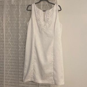 Dress in White, worn once, sits at the knee or little below